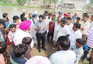 DC INSPECTS FLOOD AFFECTED AREAS