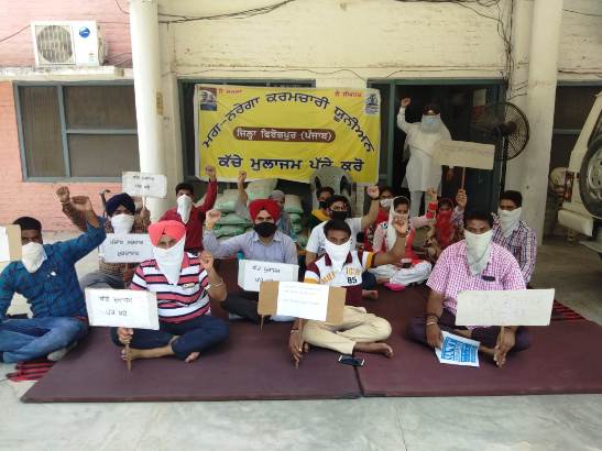 MGNREGA Employees demand regularization of services