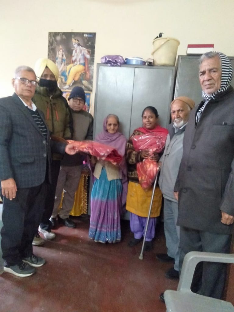 Defence Welfare Pensioners and Streamline Welfare Society distribute blankets to poor