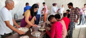 CJM visits Home for Blind, tastes and serves cooked food to inmates